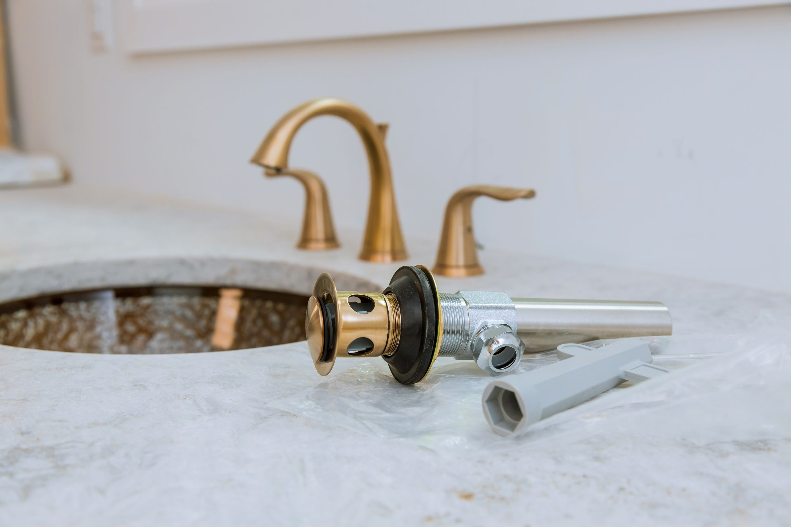 Gold tap in bathroom Drainage Plumber Perth from Perth Plumbing and Gasfitting